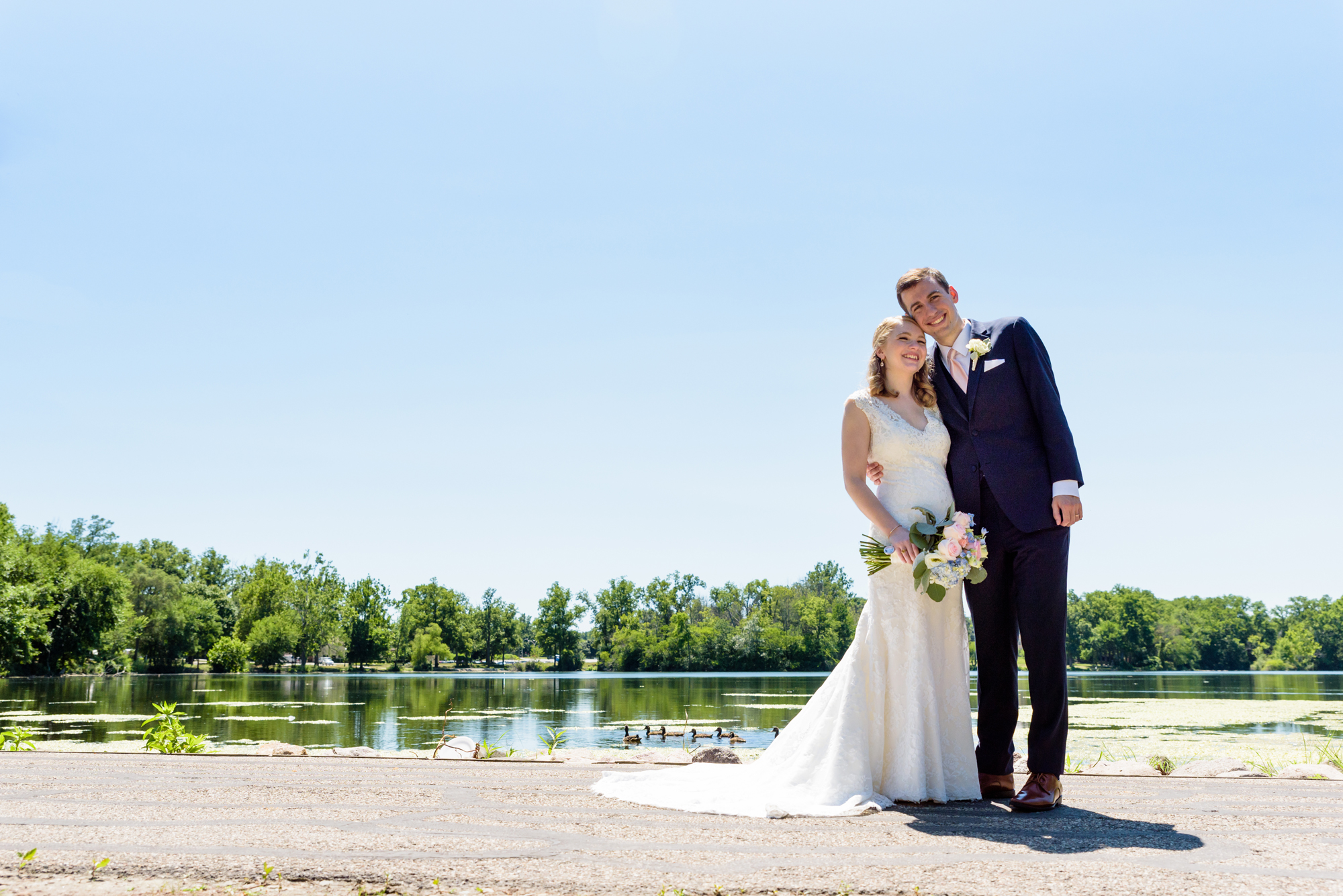 Bride & Groom at St Mary's Lake after their wedding ceremony at the Basilica of the Sacred Heart on the campus of the University of Notre Dame