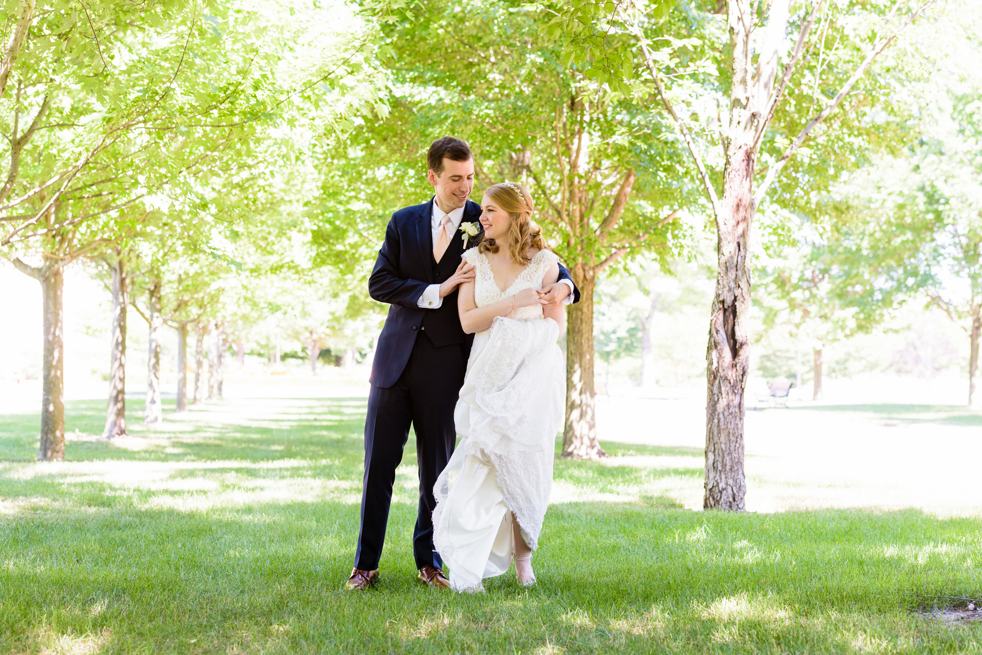 Bride & Groom on Irish Green after their wedding ceremony at the Basilica of the Sacred Heart on the campus of the University of Notre Dame