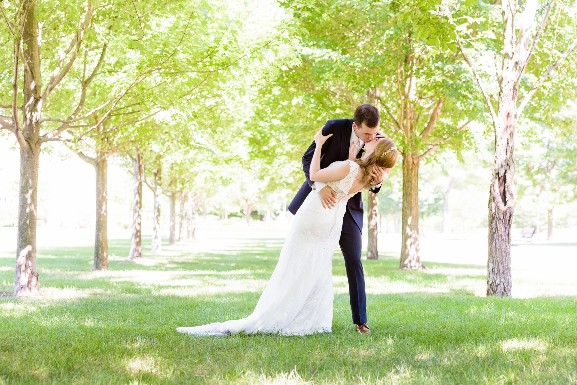 Bride & Groom on Irish Green after their wedding ceremony at the Basilica of the Sacred Heart on the campus of the University of Notre Dame