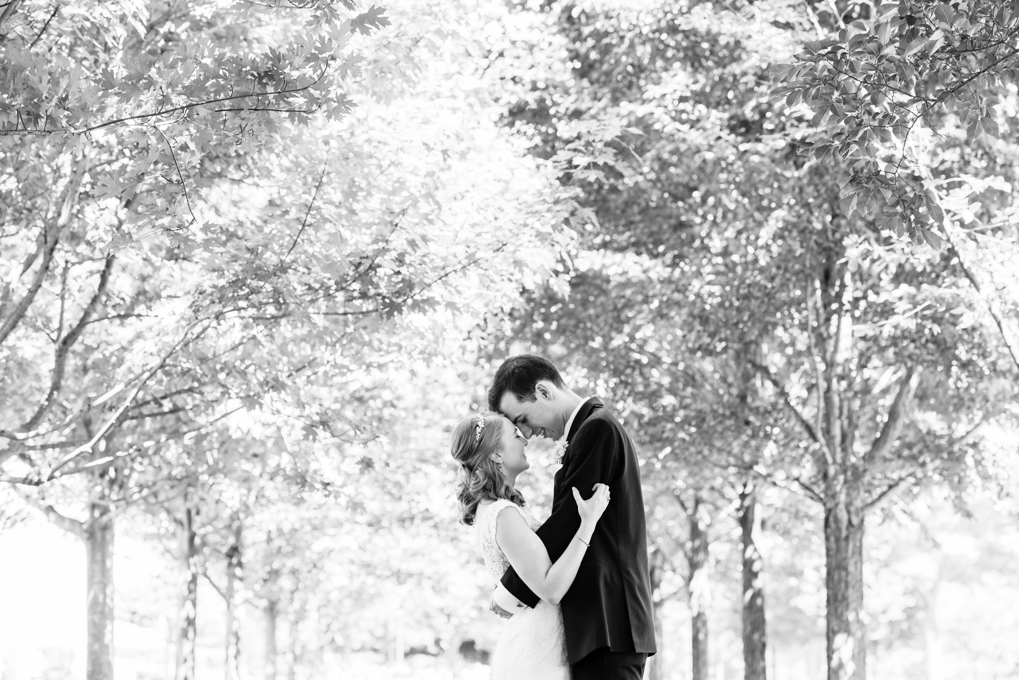 Bride & Groom on Irish Green after their wedding ceremony at the Basilica of the Sacred Heart on the campus of the University of Notre Dame