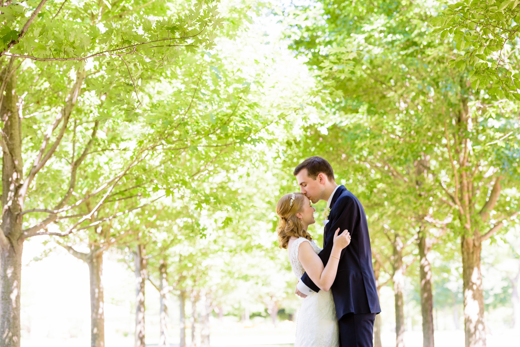 Bride & Groom on Irish Green after their wedding ceremony at the Basilica of the Sacred Heart on the campus of the University of Notre Dame