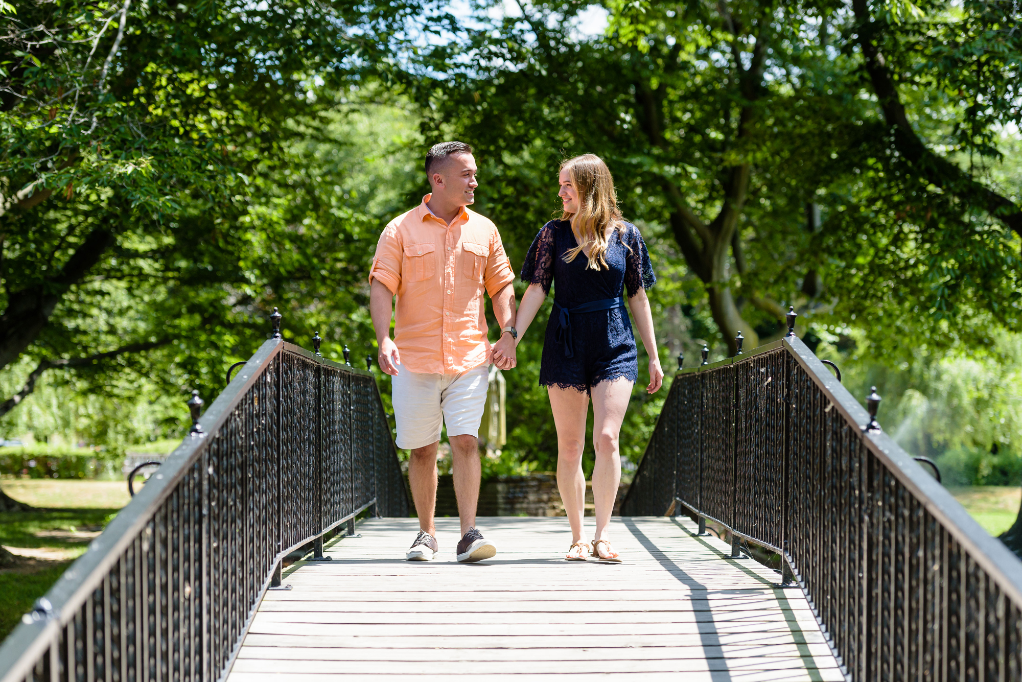 Engaged couple on the bridge on the campus of Saint Mary’s College