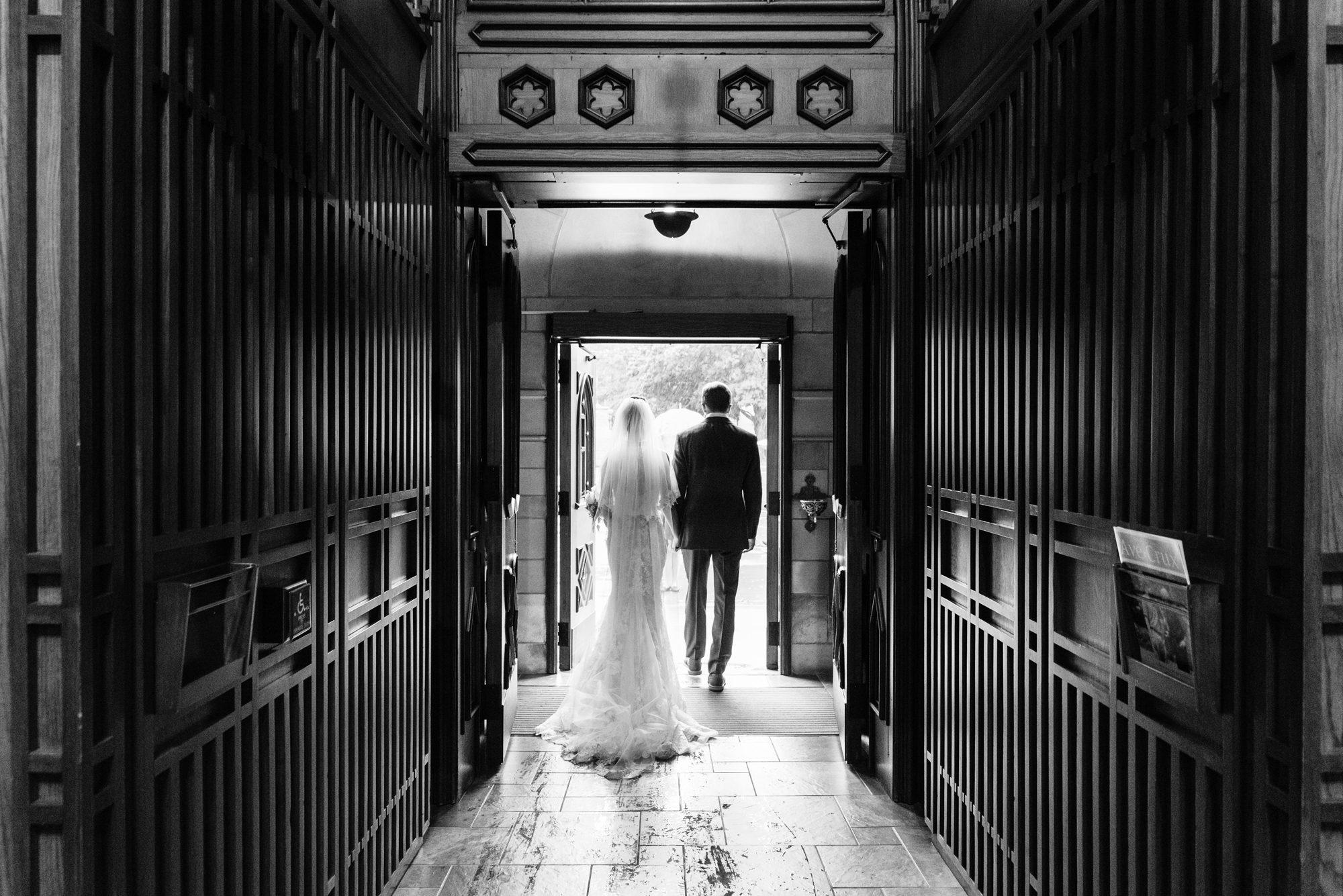 Bride & Groom leaving their wedding ceremony out the God Country Door at the Basilica of the Sacred Heart on the campus of the University of Notre Dame