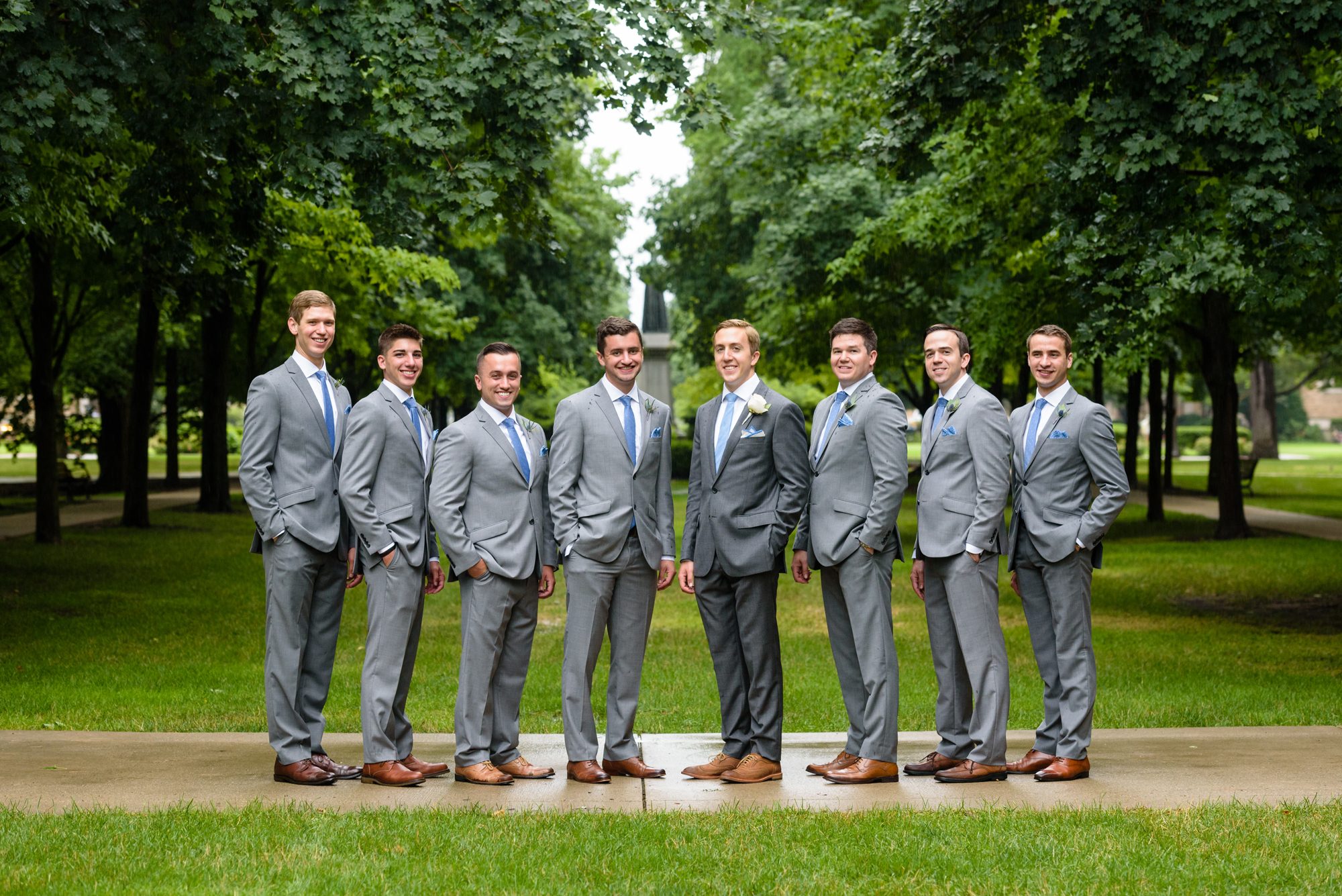 Groomsmen on God Quad after a wedding ceremony at the Basilica of the Sacred Heart on the campus of the University of Notre Dame