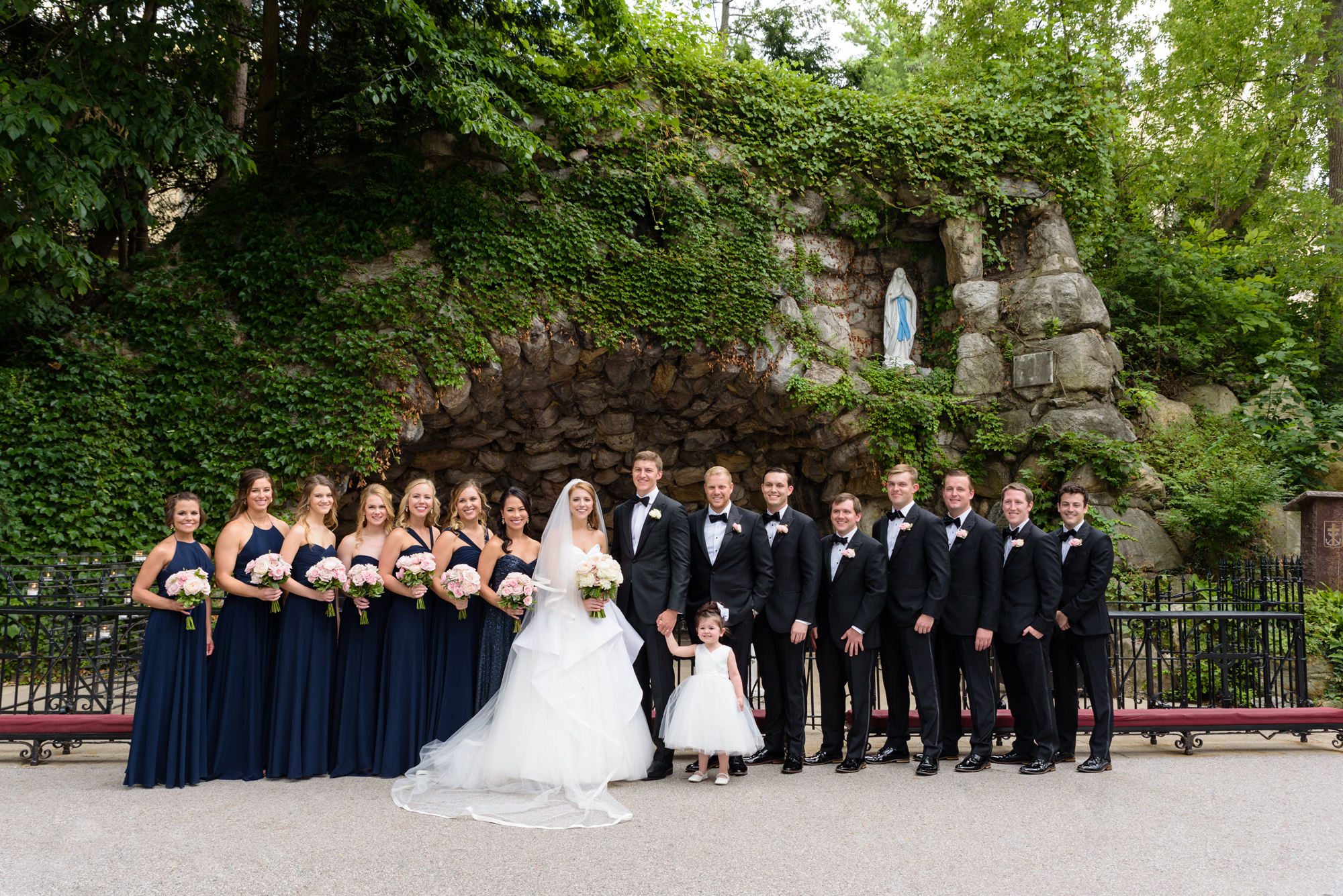 Bridal Party at the Grotto after their wedding ceremony at the Basilica of the Sacred Heart on the campus of the University of Notre Dame