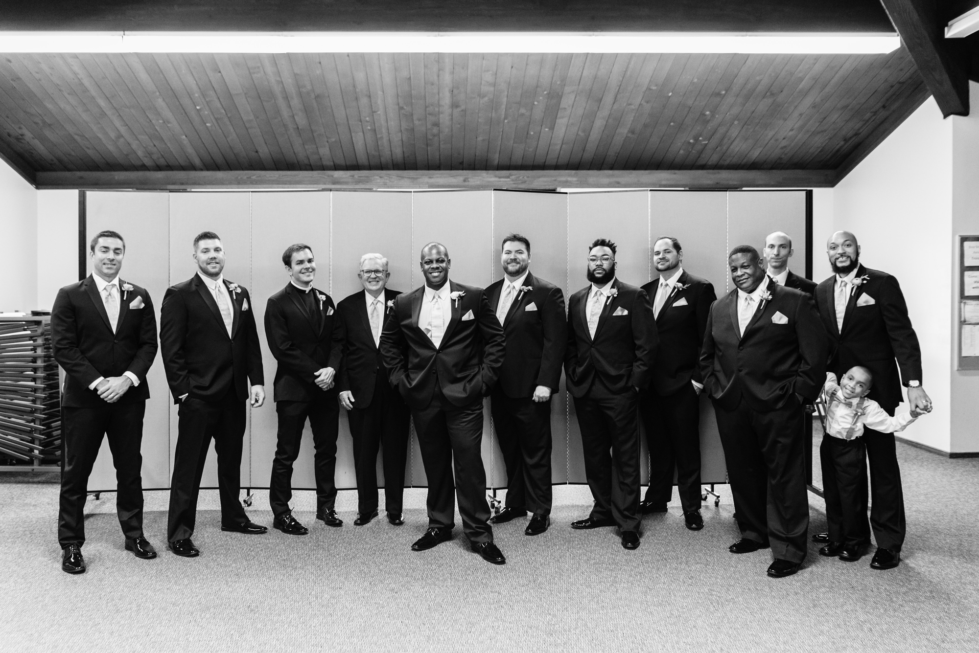 Groomsmen before a wedding ceremony at Christ the King Lutheran Church