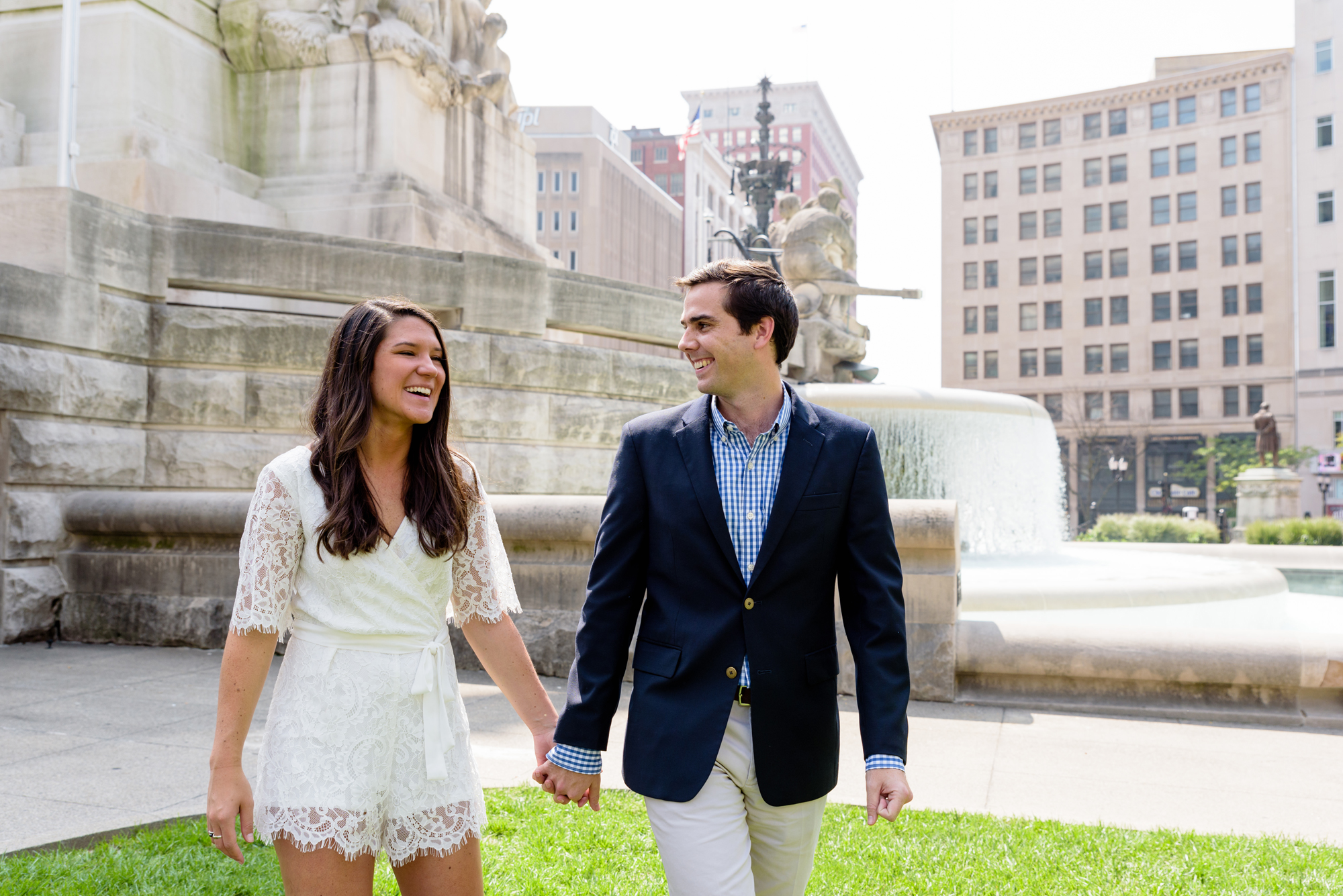 Engaged couple in front of Soldiers & Sailors monument in downtown Indianapolis