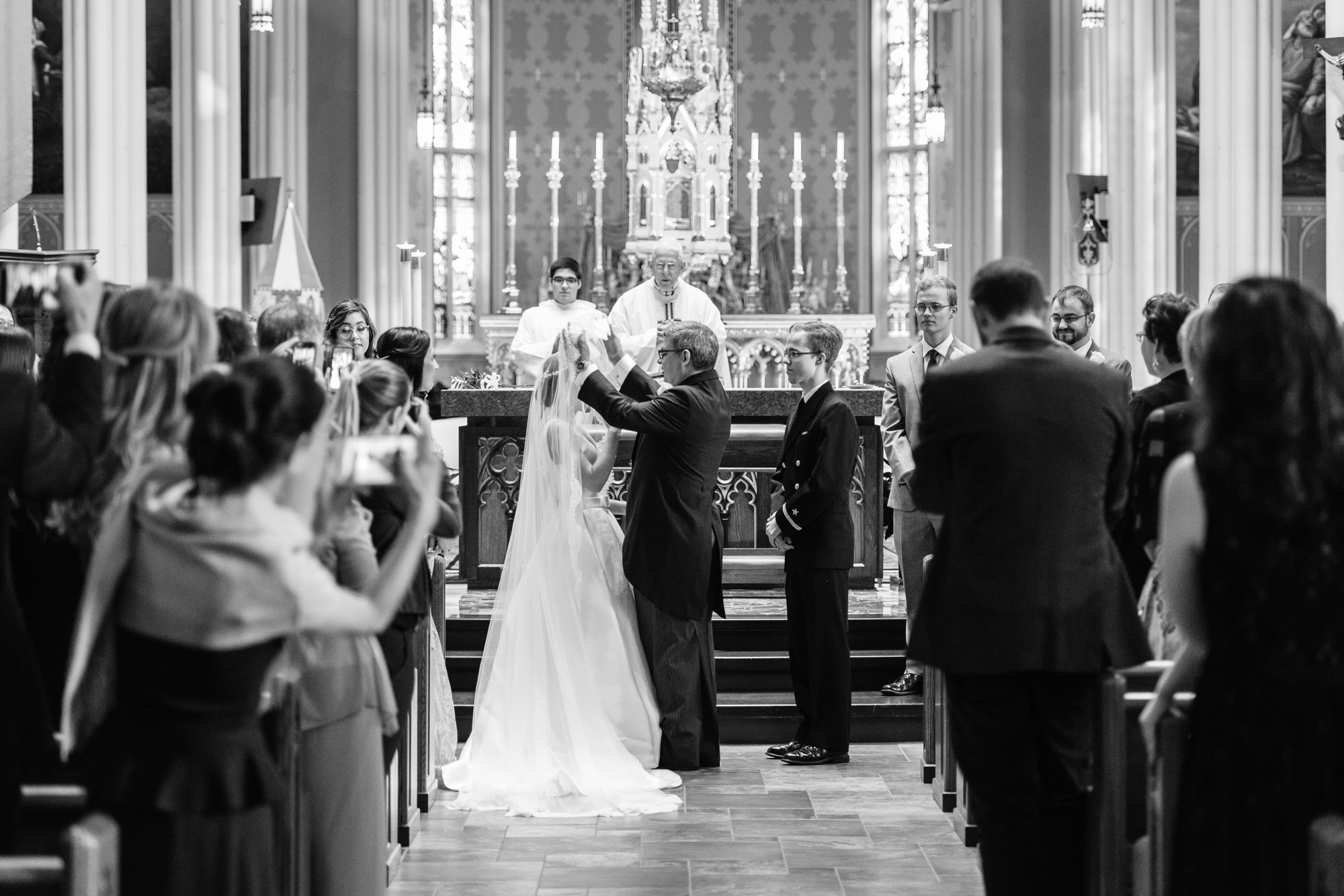 Wedding Processional at a wedding ceremony at the Basilica of the Sacred Heart on the campus of the University of Notre Dame