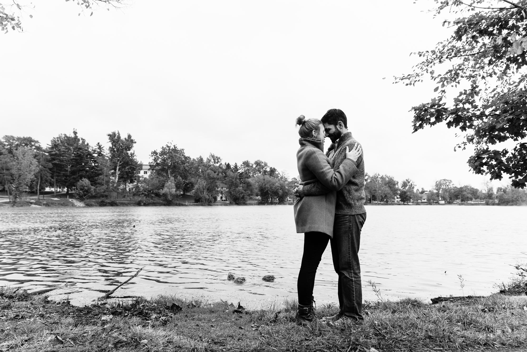 Newly engaged couple around the lakes on the campus of the University of Notre Dame