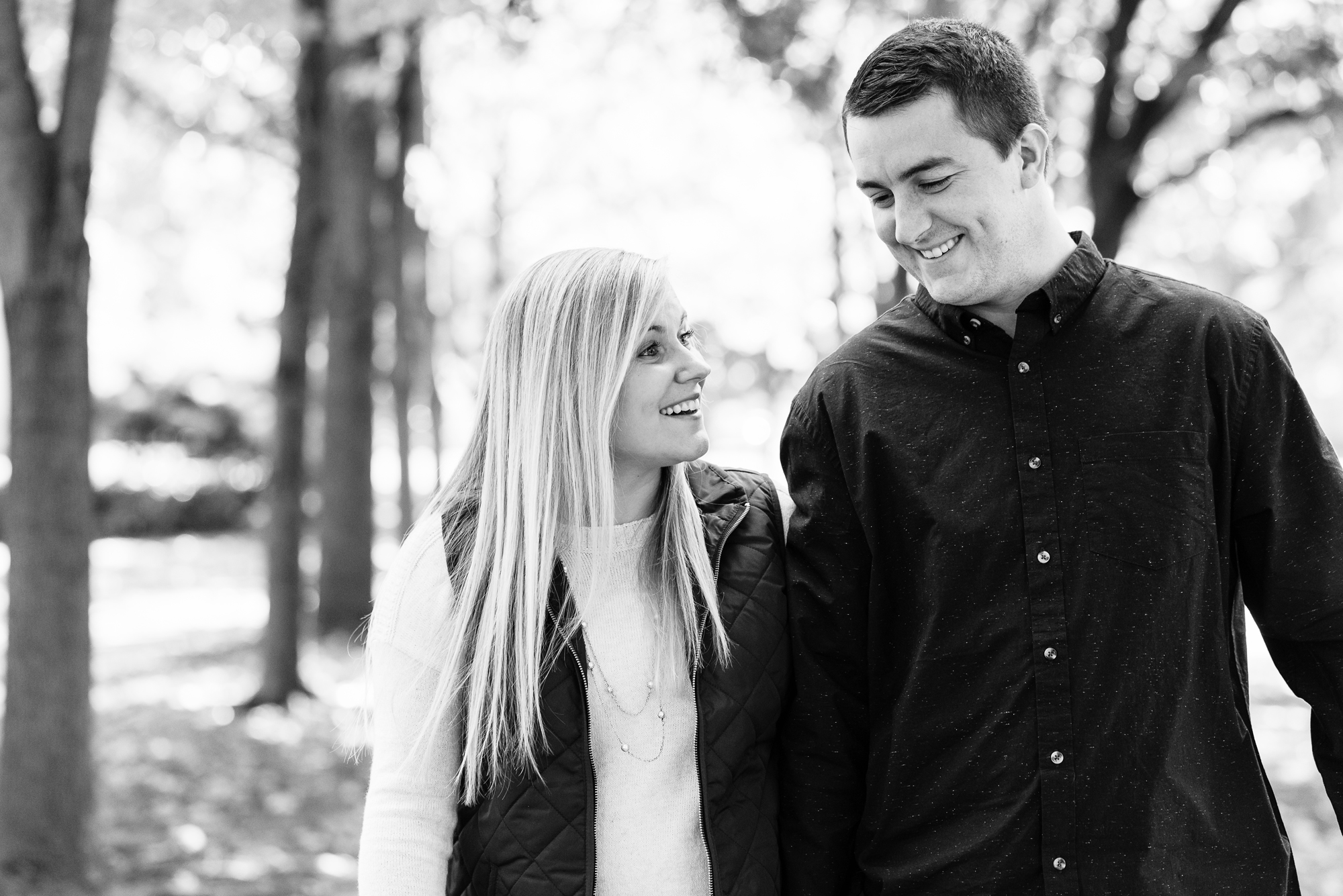 Engaged couple around God Quad on the campus of the University of Notre Dame