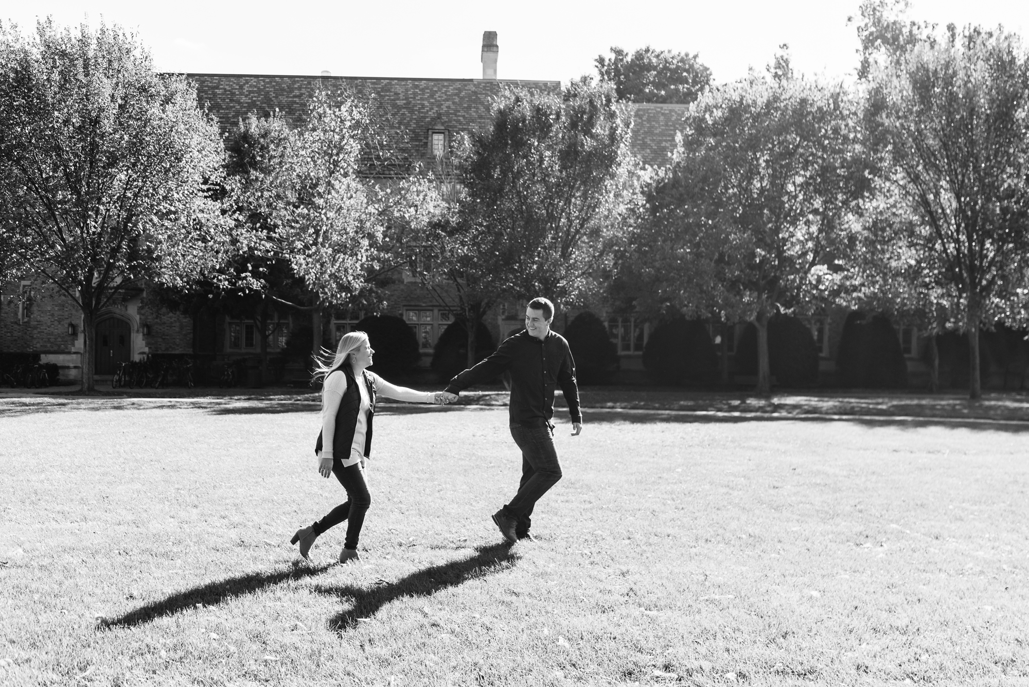 Engaged couple around South Quad on the campus of the University of Notre Dame