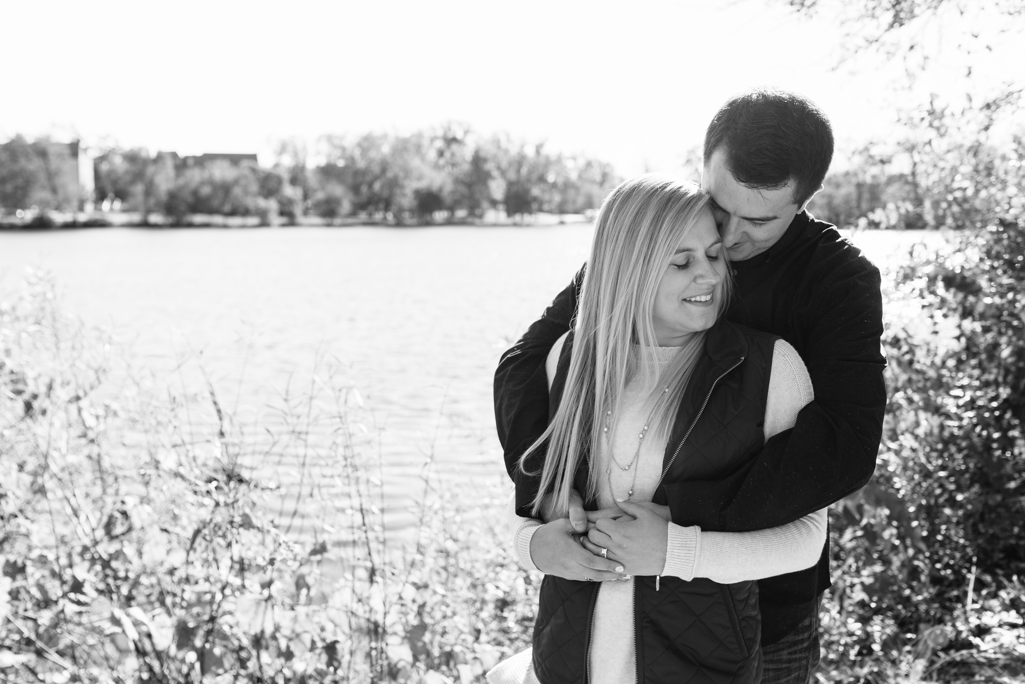 Engaged couple around St. Mary's Lake on the campus of the University of Notre Dame