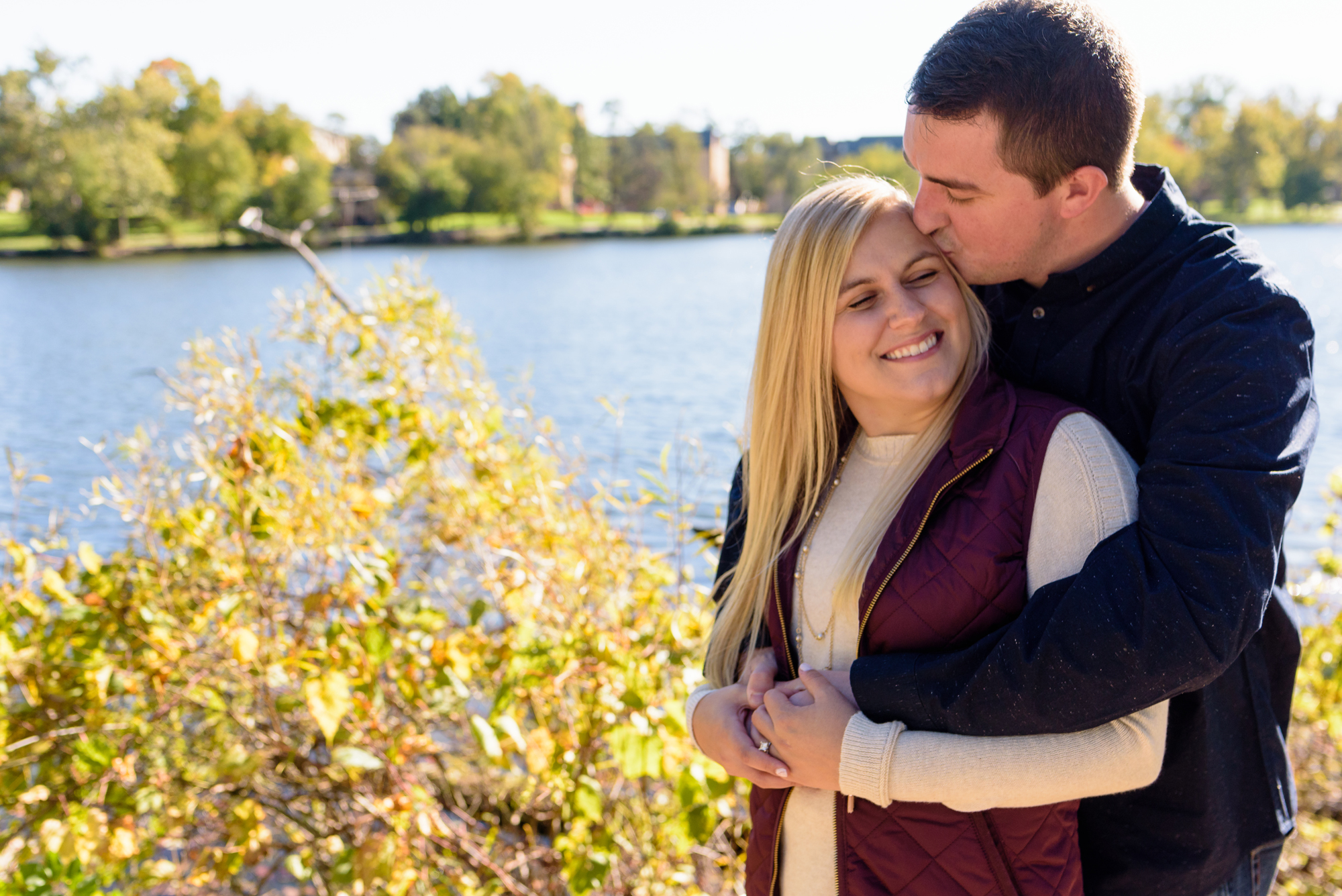 Engaged couple around St. Mary's Lake on the campus of the University of Notre Dame