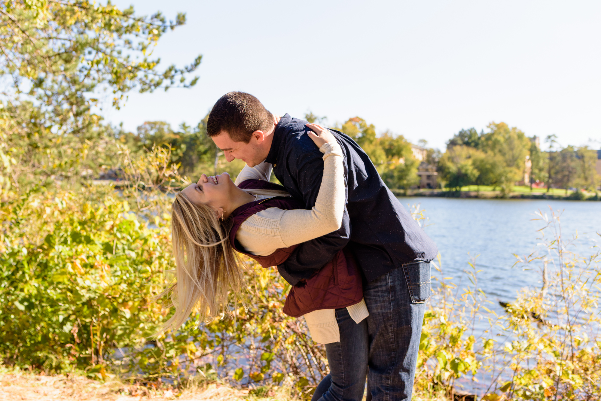 Engaged couple around St. Mary's Lake on the campus of the University of Notre Dame