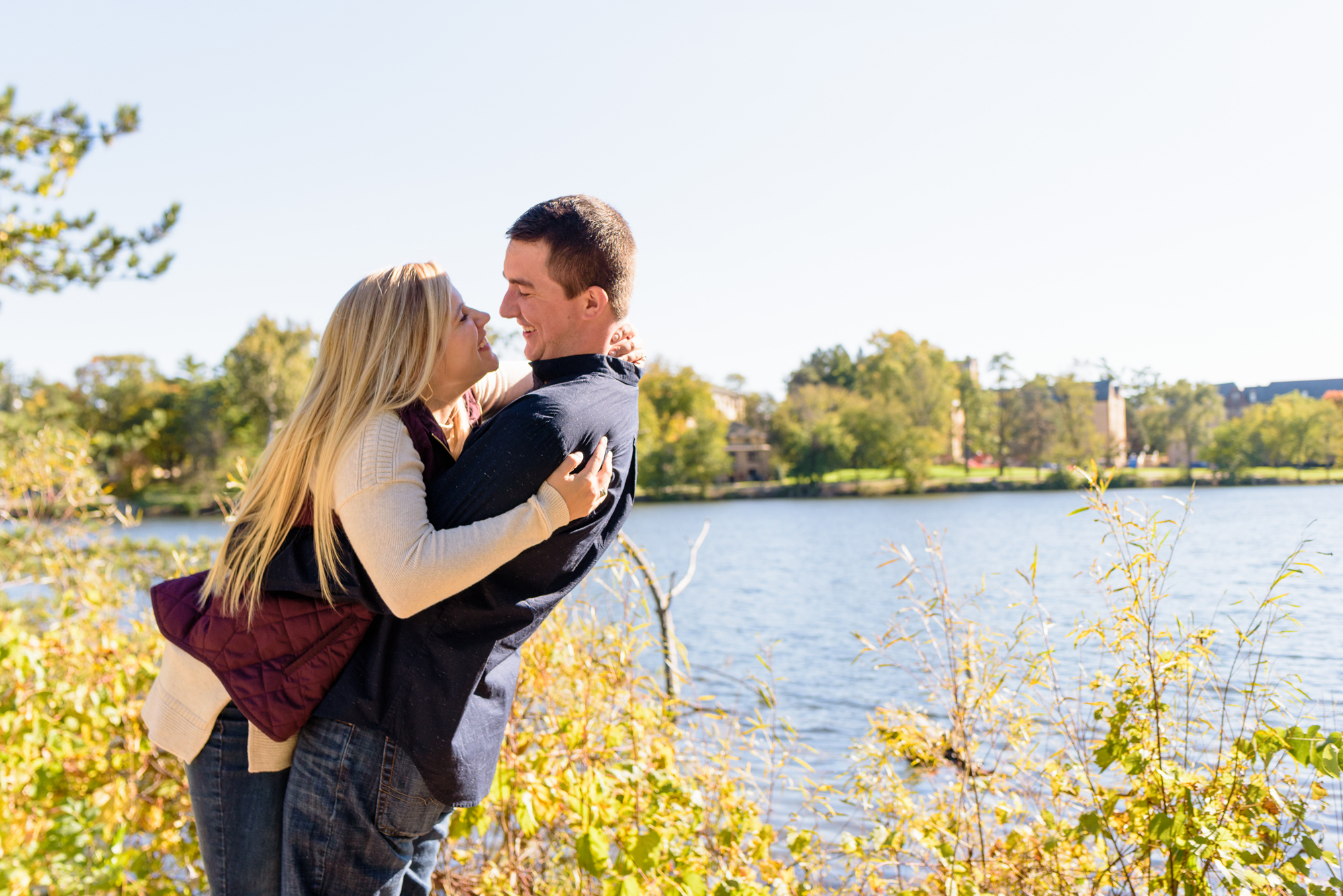 Engaged couple around St. Mary's Lake on the campus of the University of Notre Dame