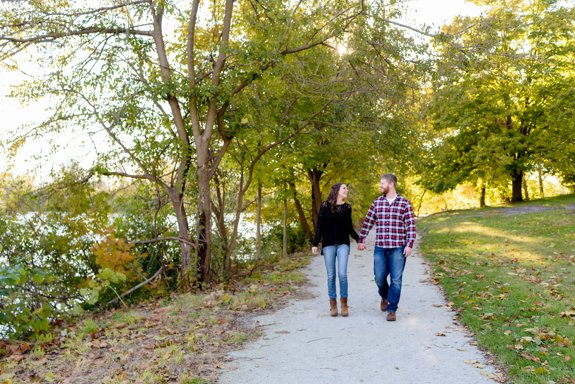 Engaged couple around St. Mary's Lake on the campus of the University of Notre Dame