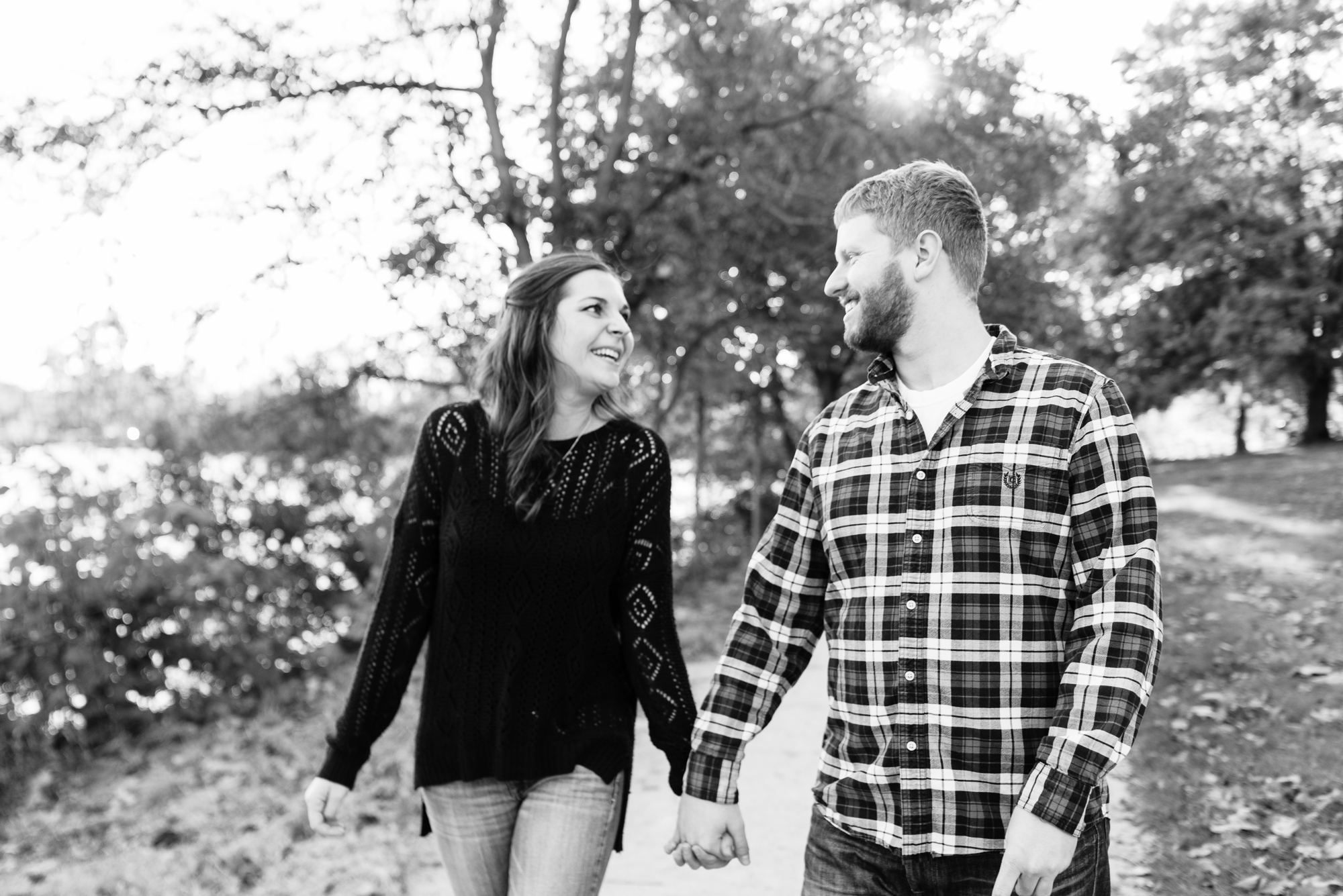 Engaged couple around St. Mary's Lake on the campus of the University of Notre Dame