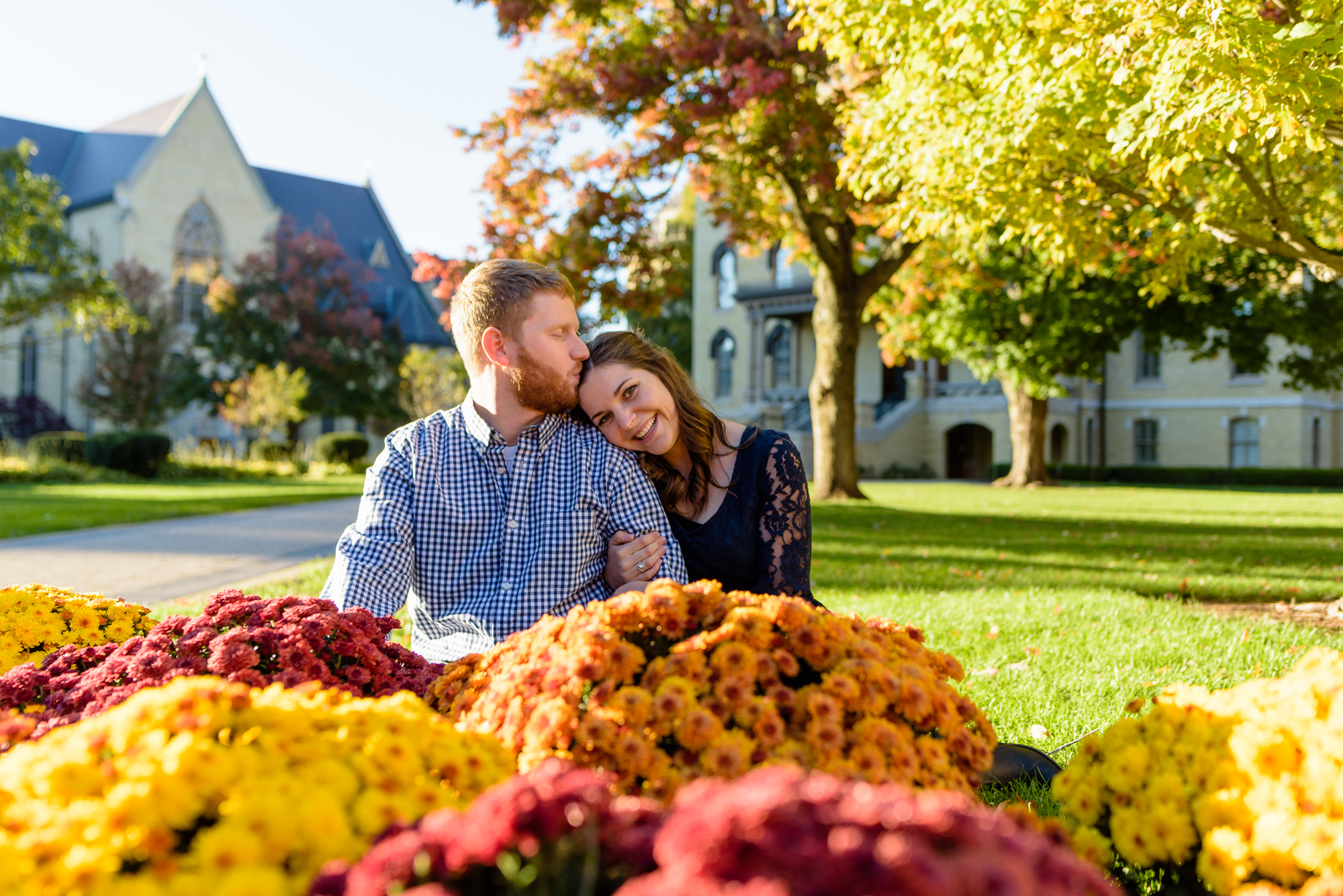 Engaged couple around God Quad on the campus of the University of Notre Dame