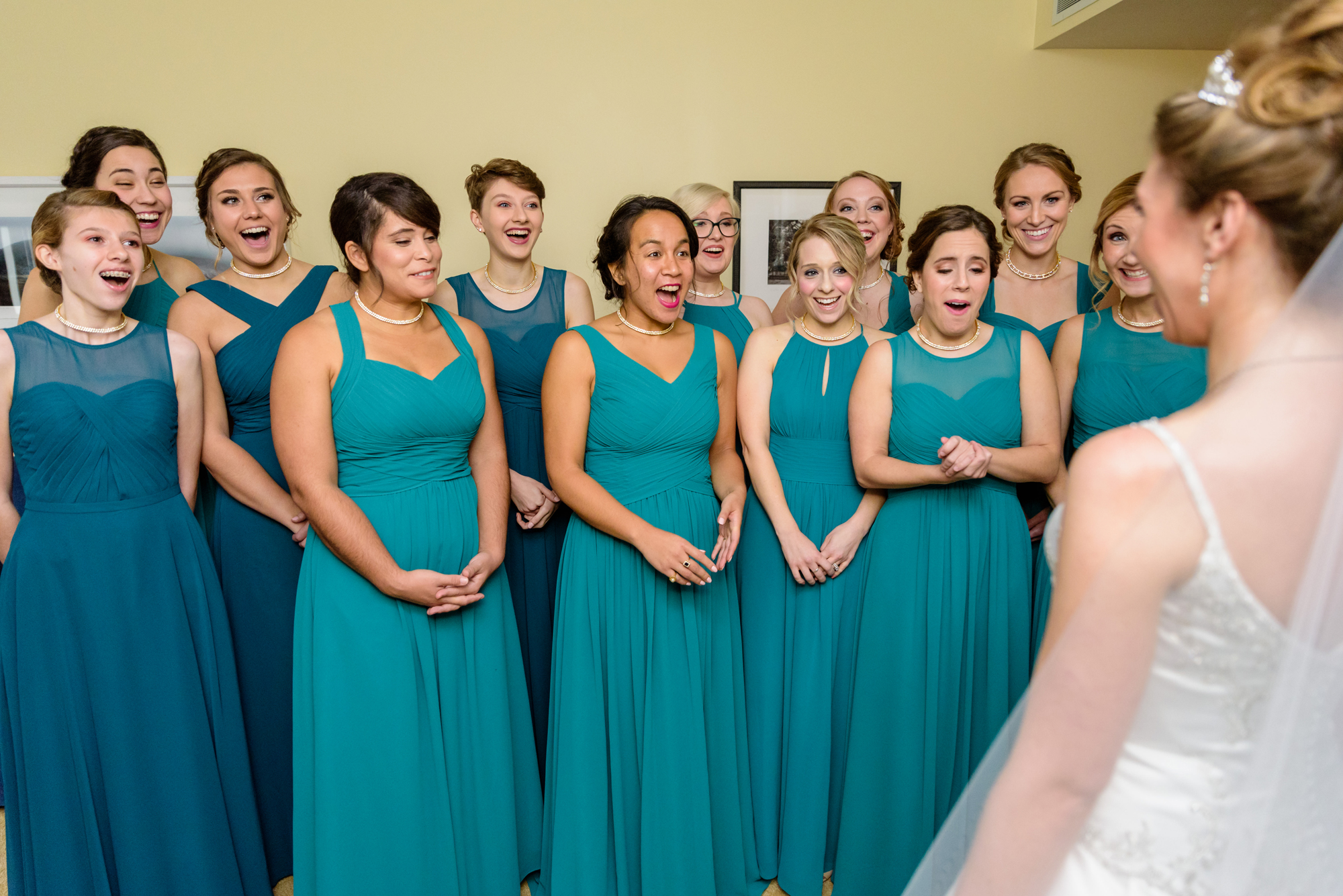 Bridesmaid reveal before a wedding ceremony at the Basilica of the Sacred Heart on the campus of the University of Notre Dame