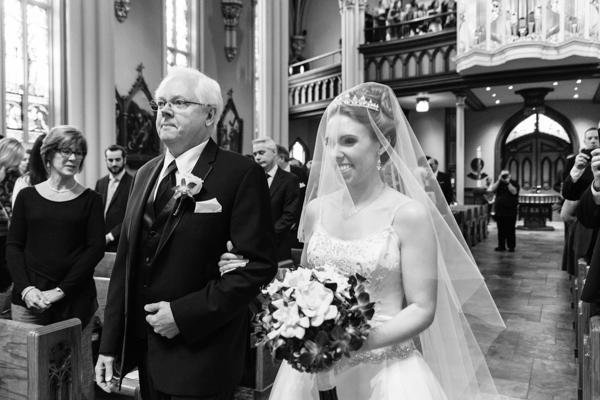 Wedding Processional at a wedding ceremony at the Basilica of the Sacred Heart on the campus of the University of Notre Dame