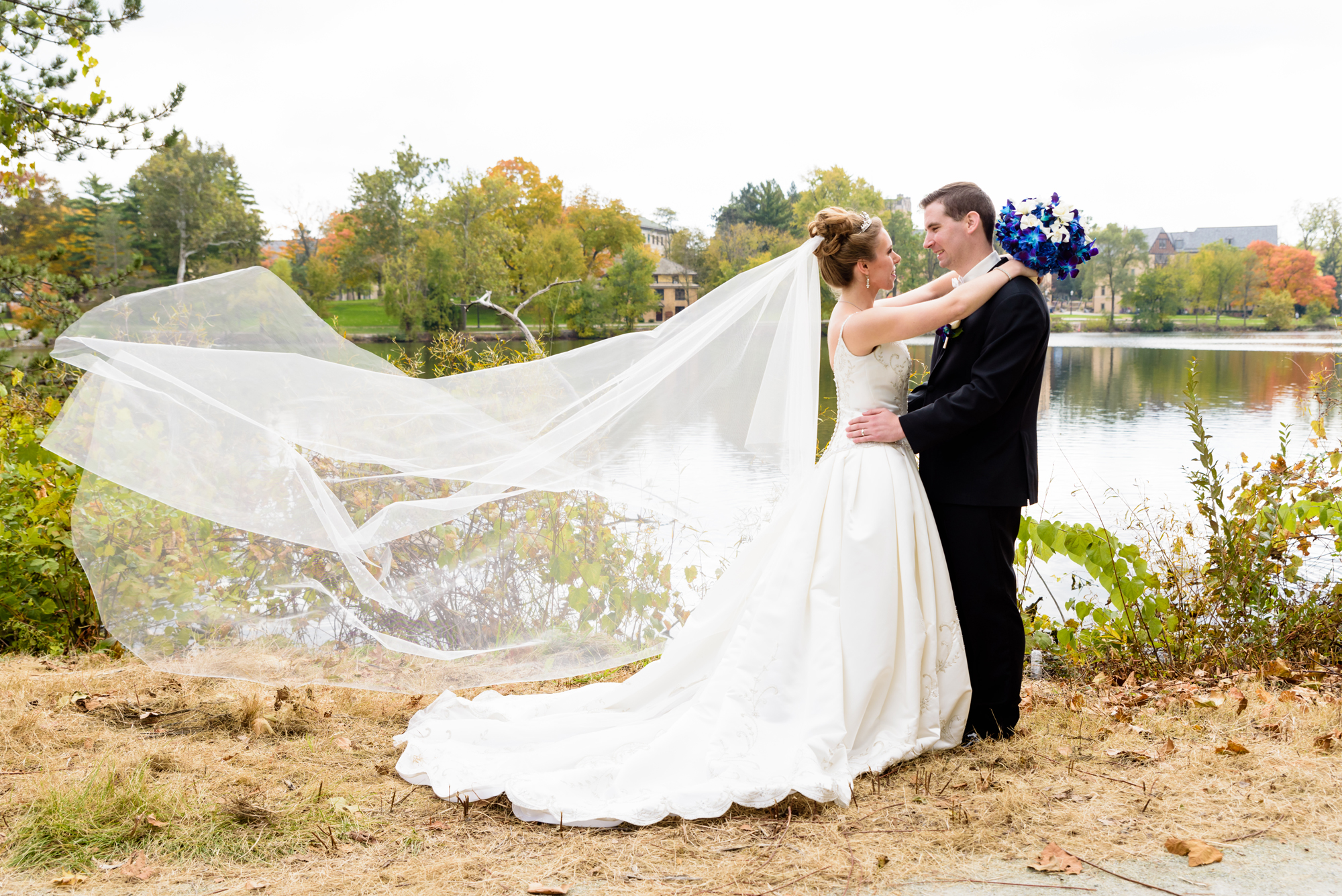 Bride & Groom around St Mary’s Lake after their wedding ceremony at the Basilica of the Sacred Heart on the campus of the University of Notre Dame