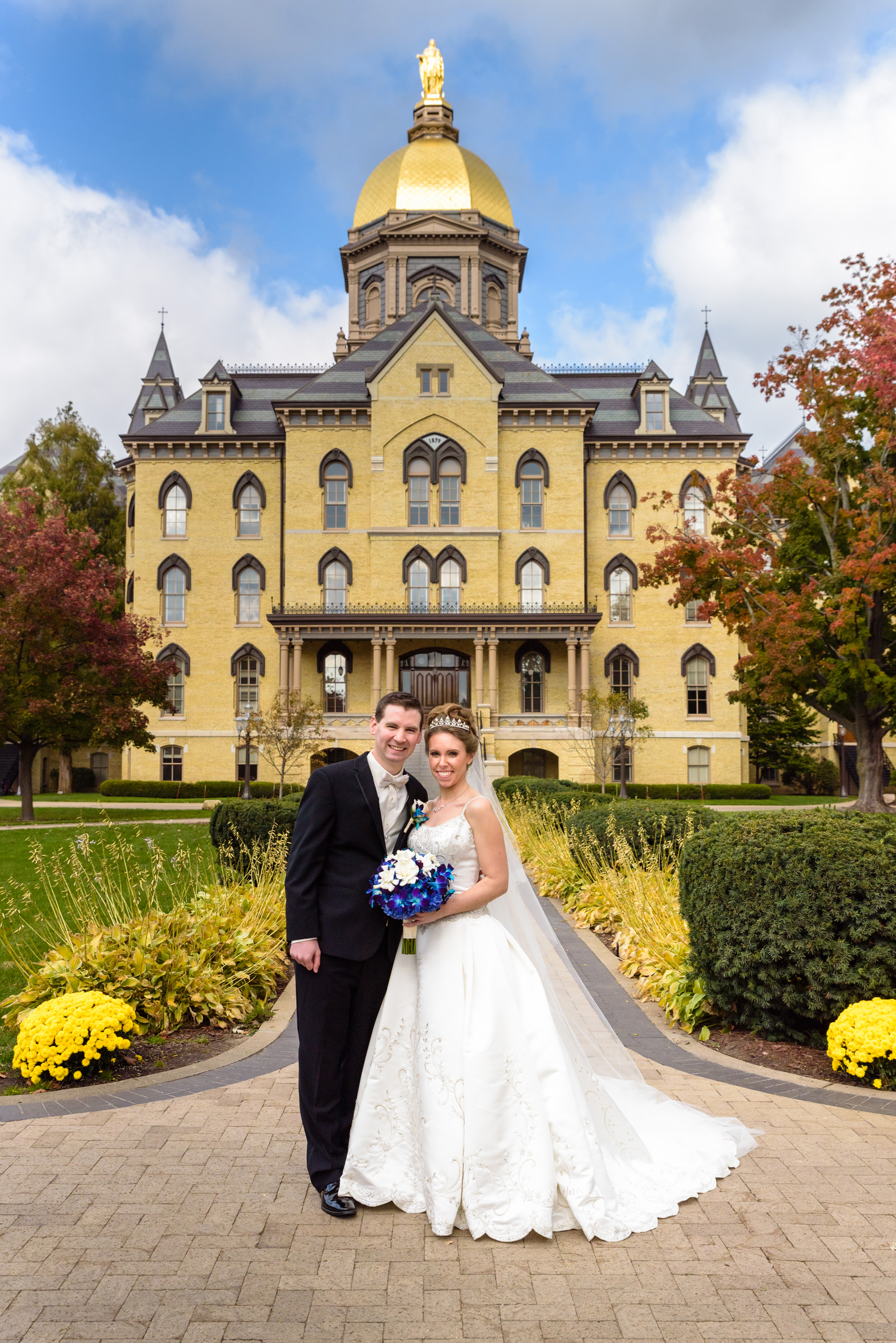 Bride & Groom in front of the Golden Dome after their wedding ceremony at the Basilica of the Sacred Heart on the campus of the University of Notre Dame