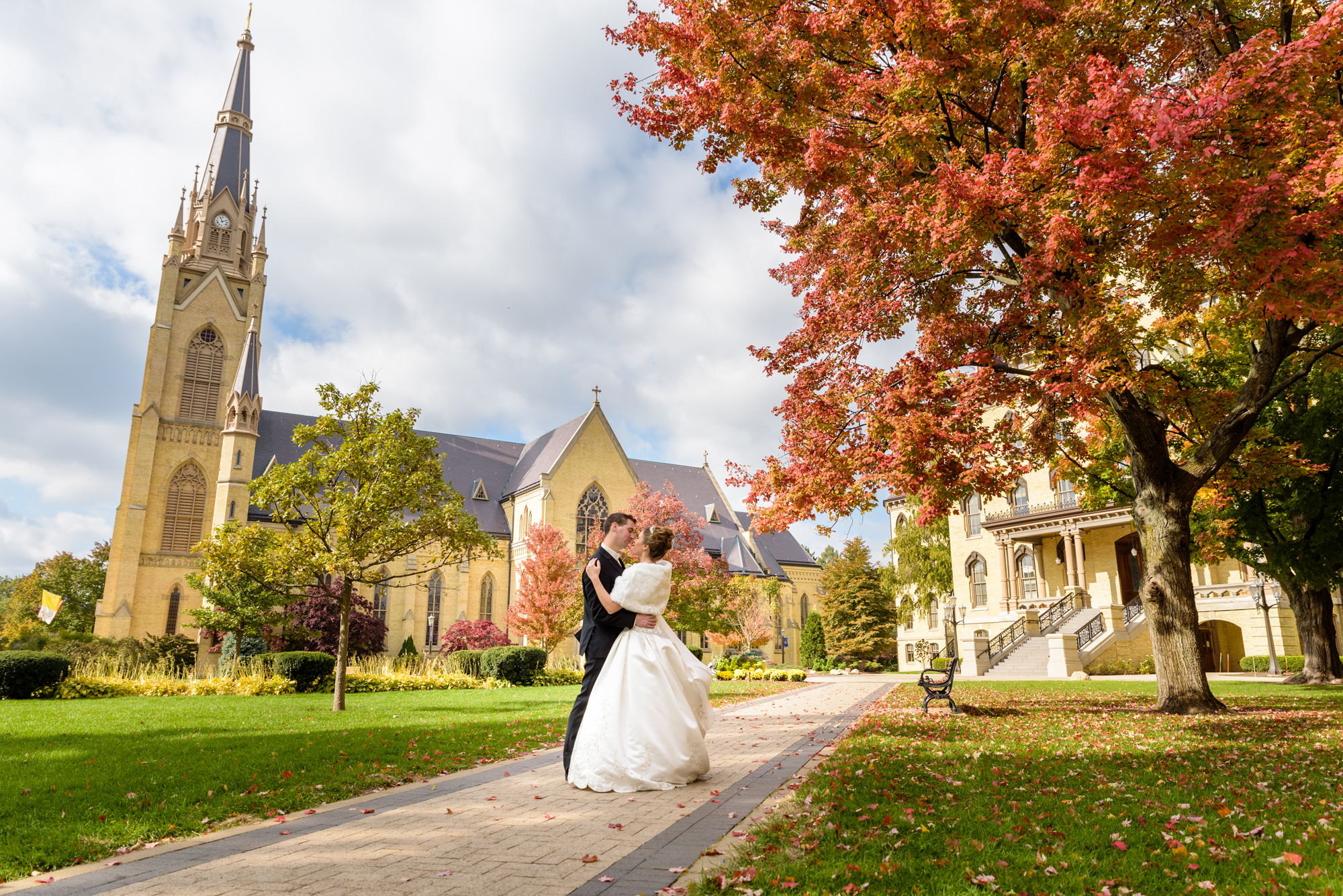 Bride & Groom around God Quad after their wedding ceremony at the Basilica of the Sacred Heart on the campus of the University of Notre Dame