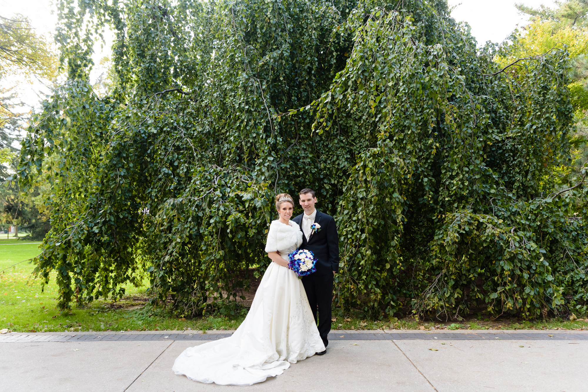 Bride & Groom around God Quad after their wedding ceremony at the Basilica of the Sacred Heart on the campus of the University of Notre Dame