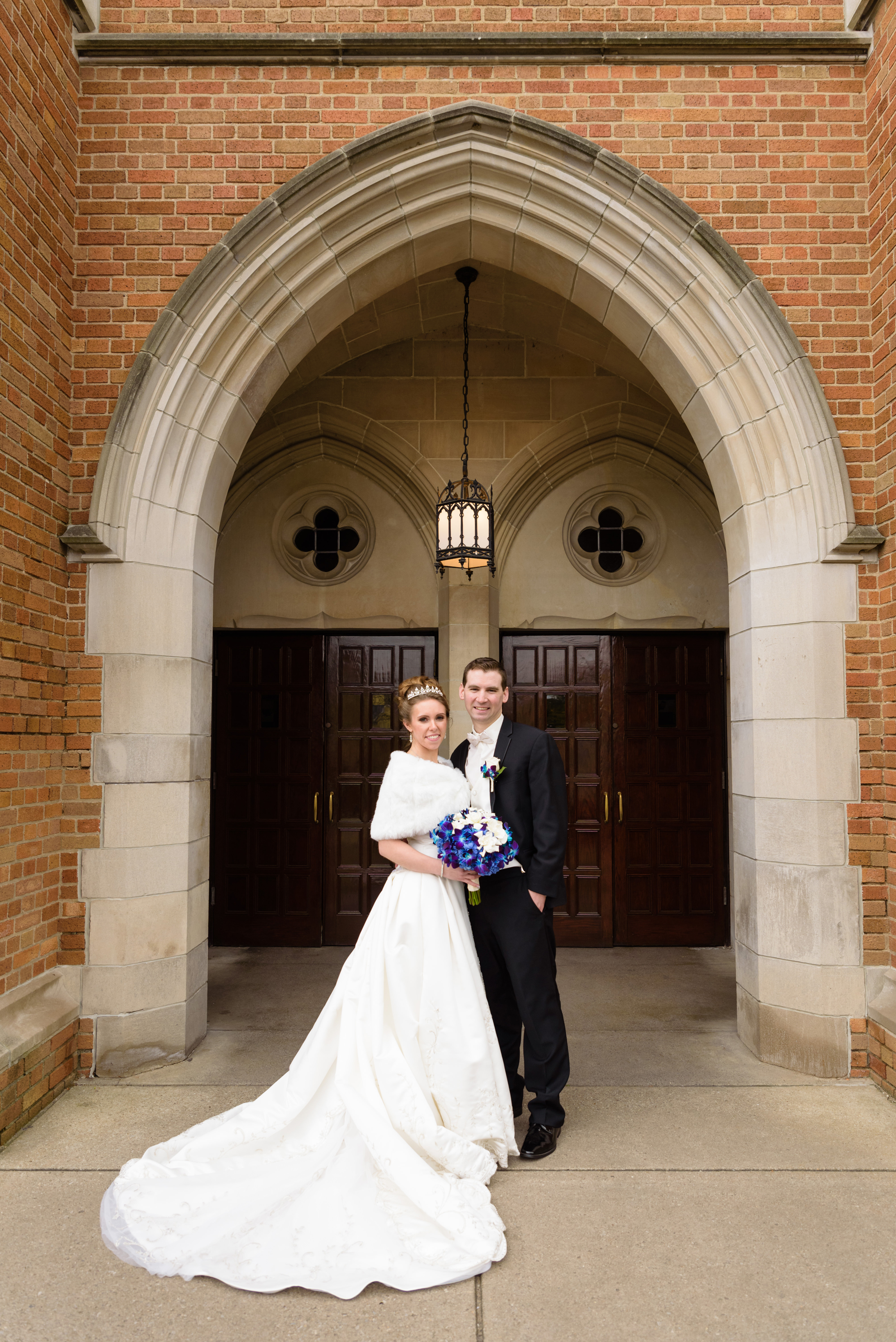 Bride & Groom in front of South Dining Hall after their wedding ceremony at the Basilica of the Sacred Heart on the campus of the University of Notre Dame