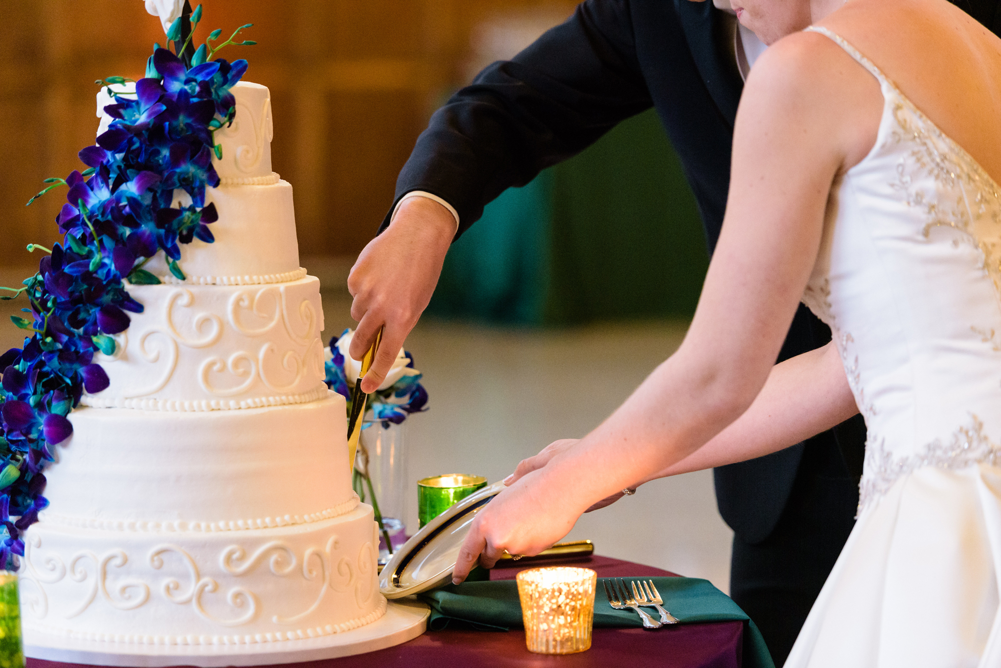 Bride & Groom’s cake cutting at a Wedding Reception at the South Dining Hall on the campus of the University of Notre Dame