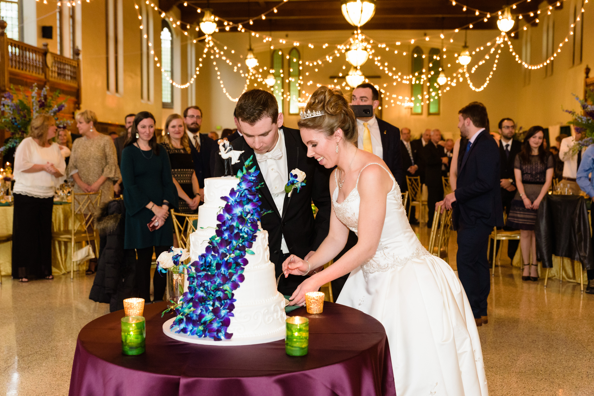 Bride & Groom’s cake cutting at a Wedding Reception at the South Dining Hall on the campus of the University of Notre Dame