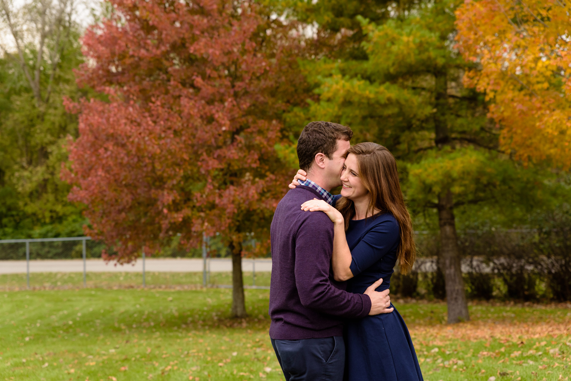 Engaged Couple in the fall at Saint Patrick's Park in South Bend, IN