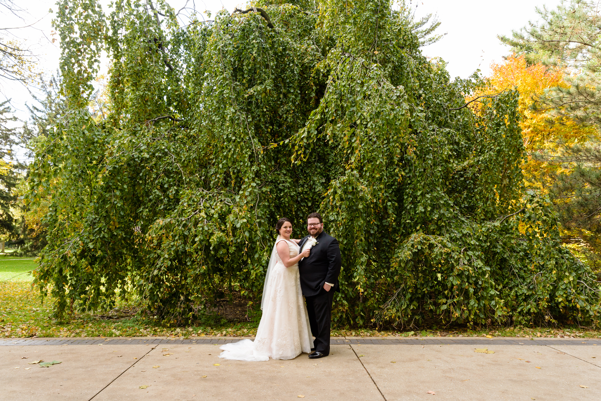 Bride & Groom around God Quad after their wedding ceremony at the Basilica of the Sacred Heart on the campus of the University of Notre Dame