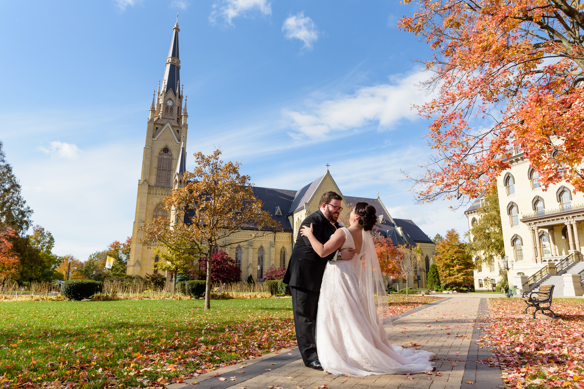 Bride & Groom in front of Basilica after their wedding ceremony at the Basilica of the Sacred Heart on the campus of the University of Notre Dame