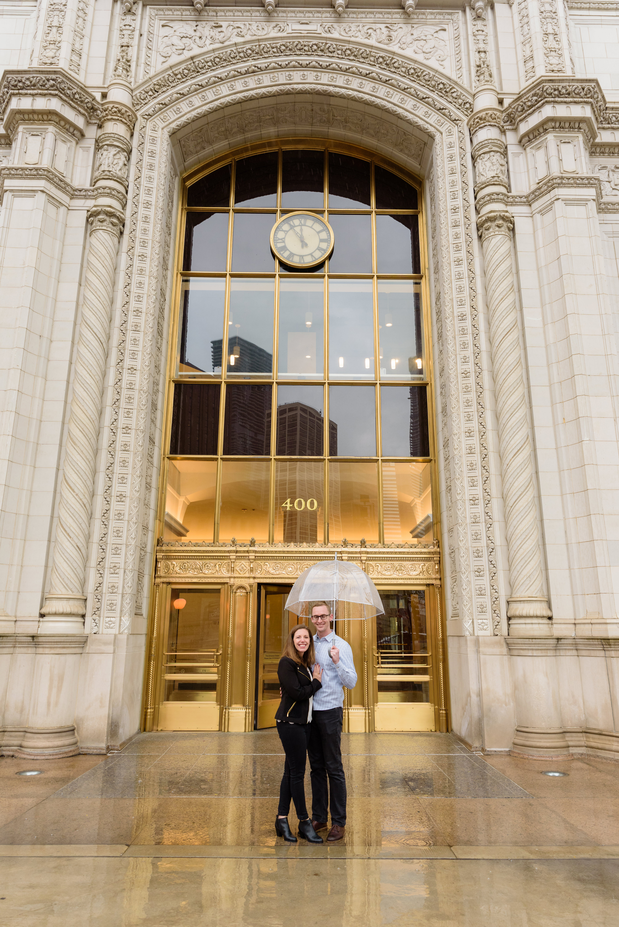 Engaged couple at the Wrigley Building in downtown Chicago