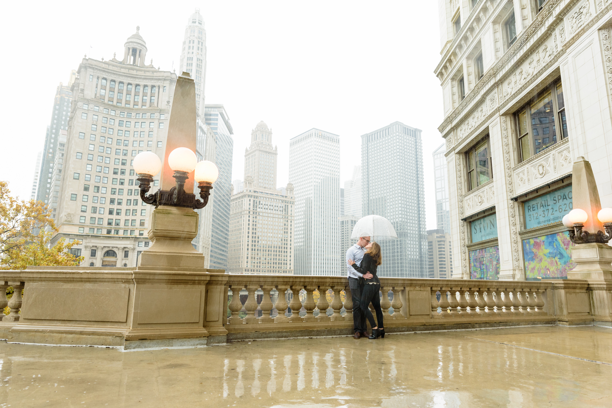 Engaged couple at the Wrigley Building in downtown Chicago