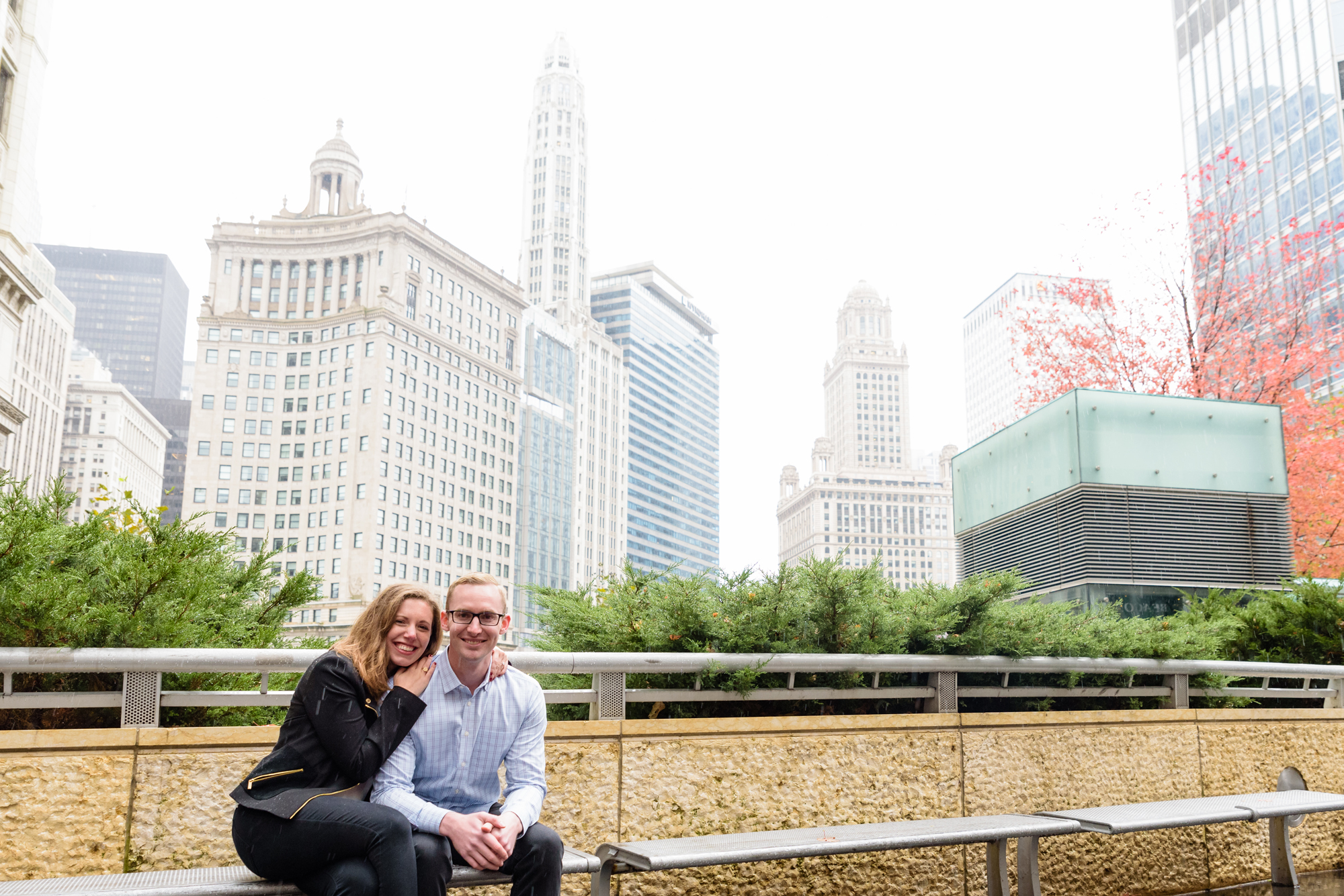 Engaged couple along the riverwalk downtown Chicago