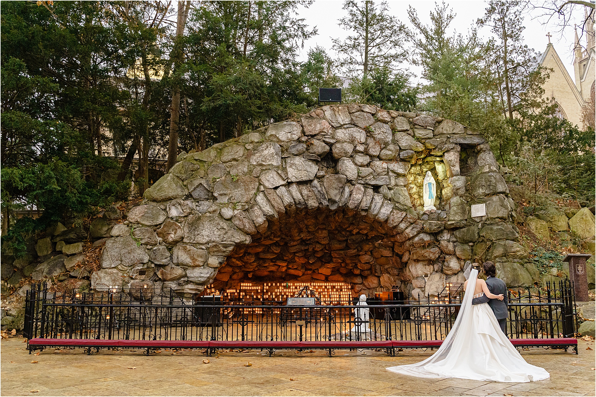 053-Caitlin-Kevin-Katie-Whitcomb-Photography-classic-elegant-notre-dame-winter-wedding-grotto.jpg