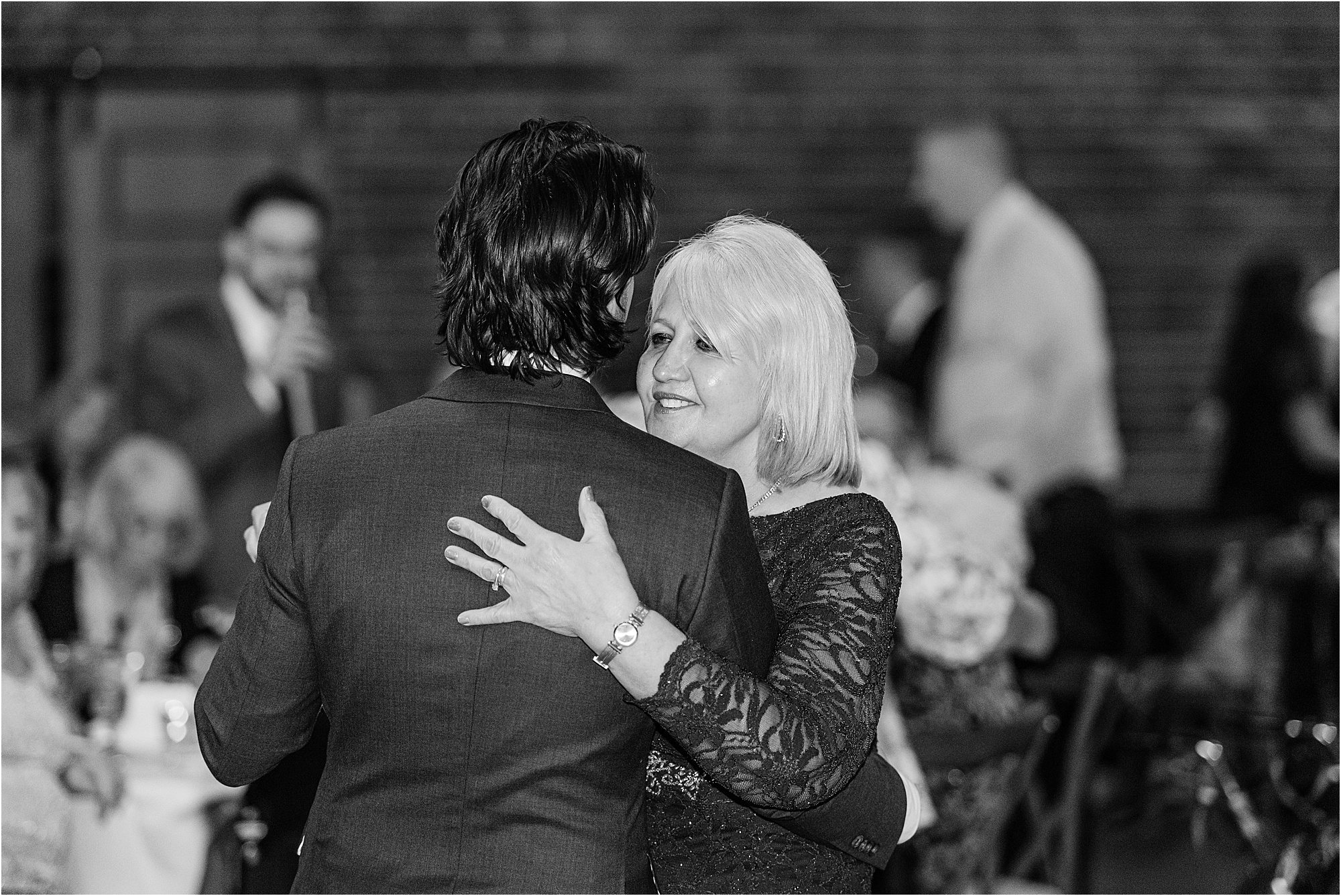 072-Caitlin-Kevin-Katie-Whitcomb-Photography-classic-elegant-the-armory-winter-wedding-mother-son-dance.jpg