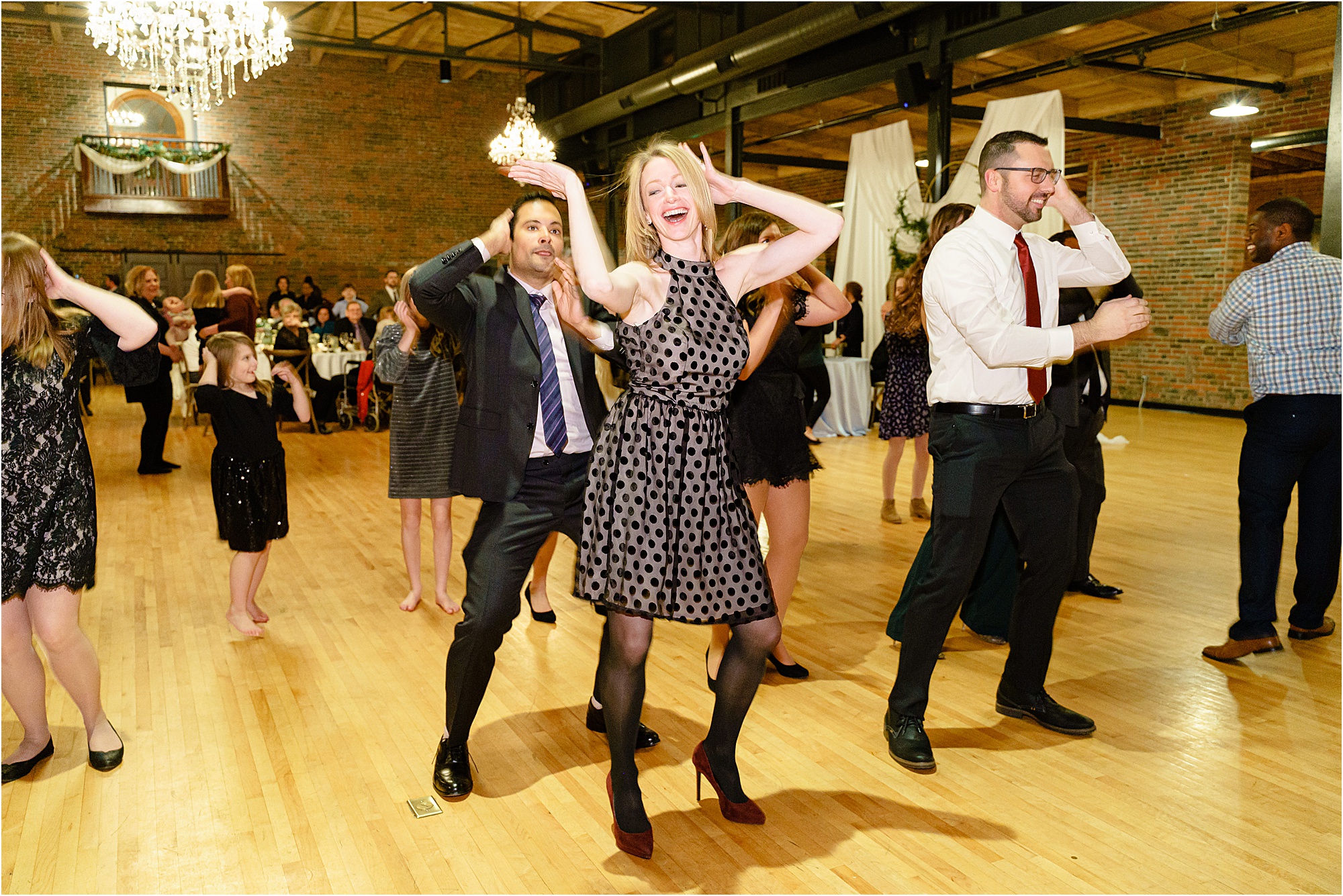 075-Caitlin-Kevin-Katie-Whitcomb-Photography-classic-elegant-the-armory-winter-wedding-open-dancing.jpg