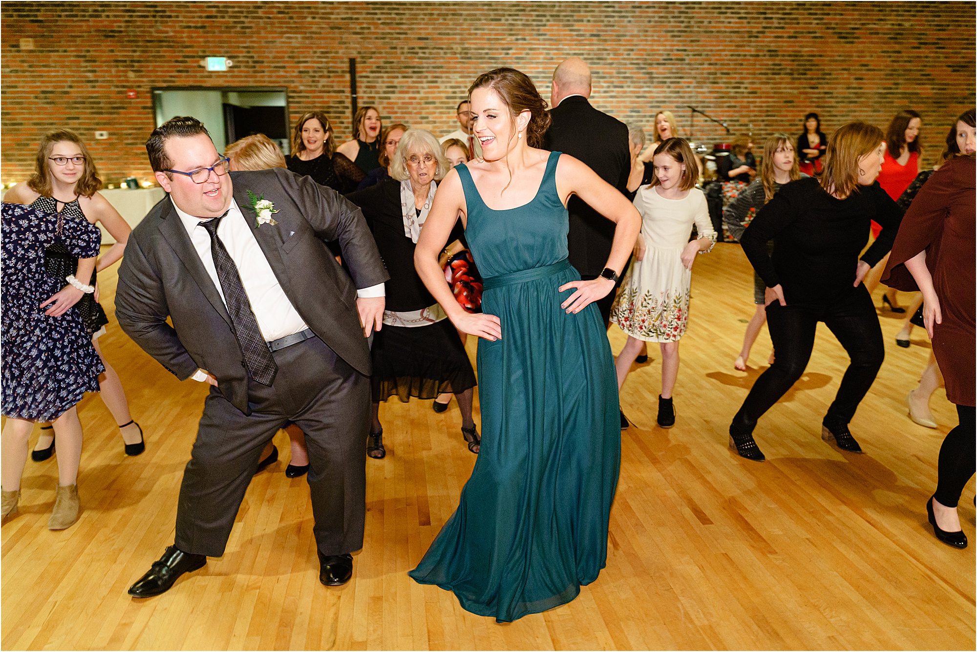 076-Caitlin-Kevin-Katie-Whitcomb-Photography-classic-elegant-the-armory-winter-wedding-open-dancing.jpg